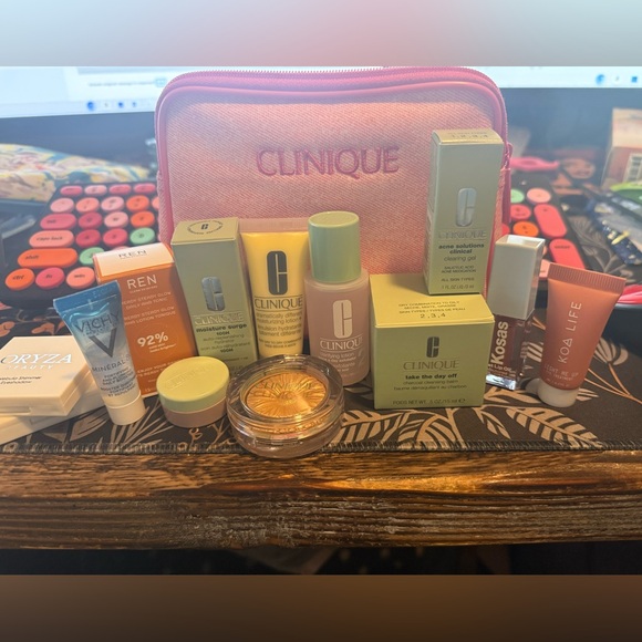 Clinique Accessories - Clinique Pink Cosmetic Bag with Skincare Essentials